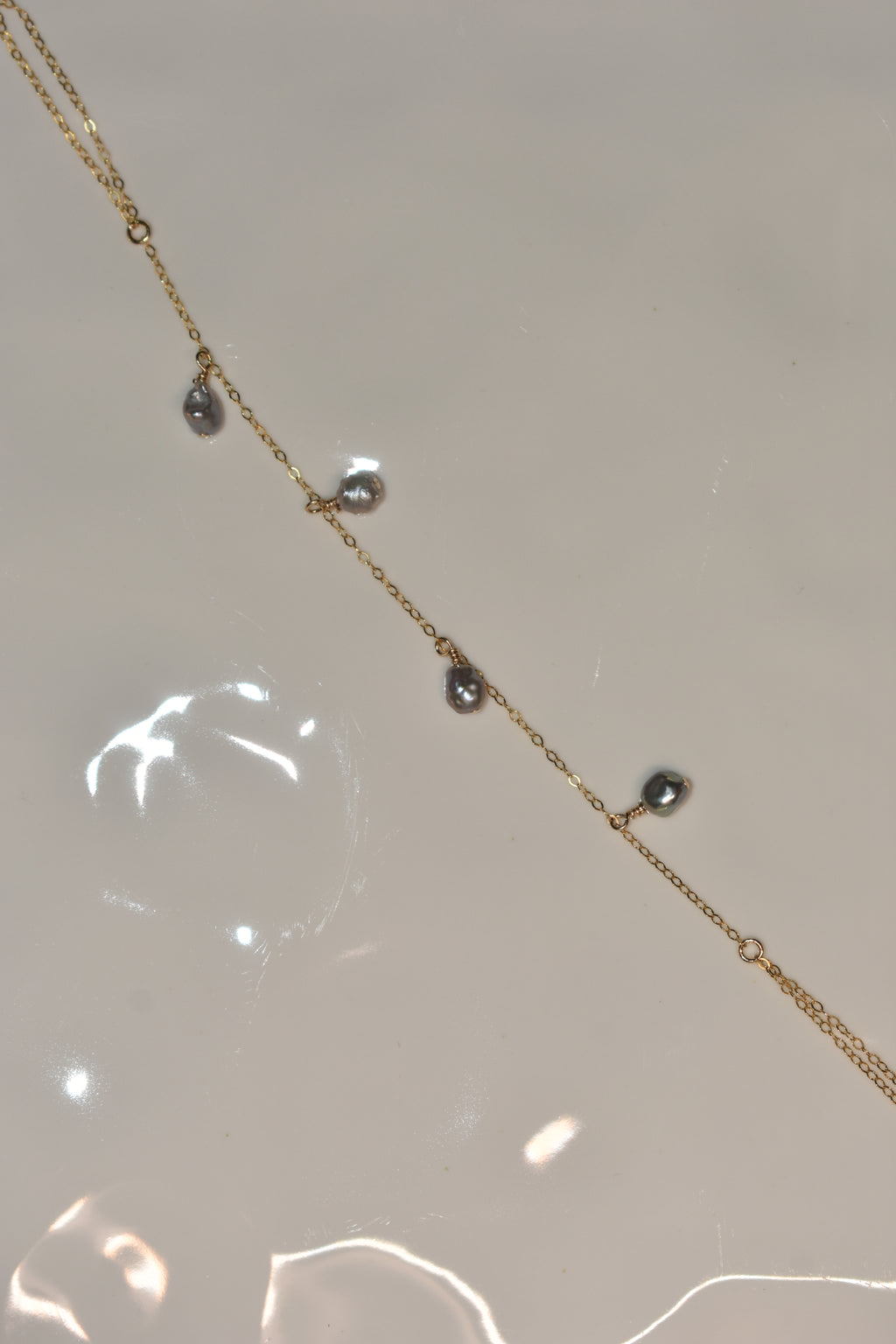 keshi girl hand chain